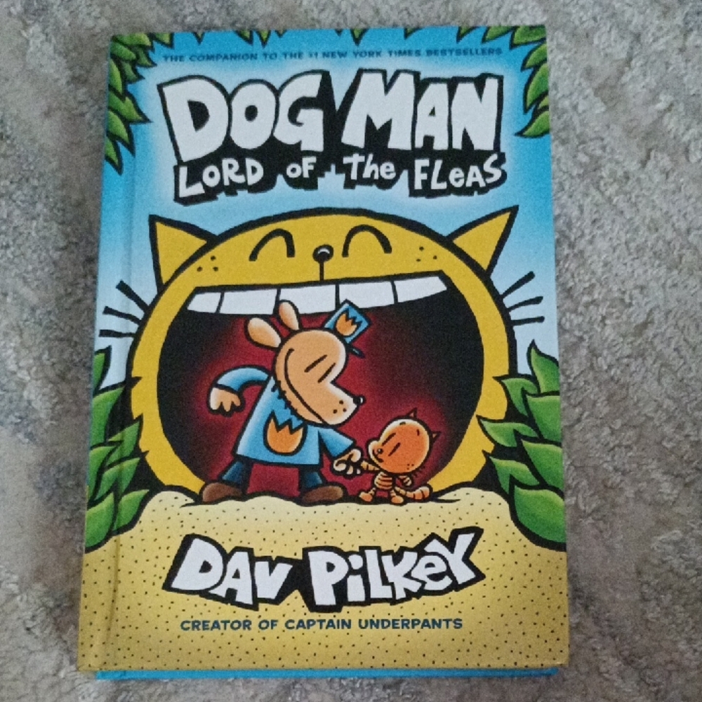 Scholastic Dog Man: Lord of the Fleas - Vibrant Blue and Yellow Cover